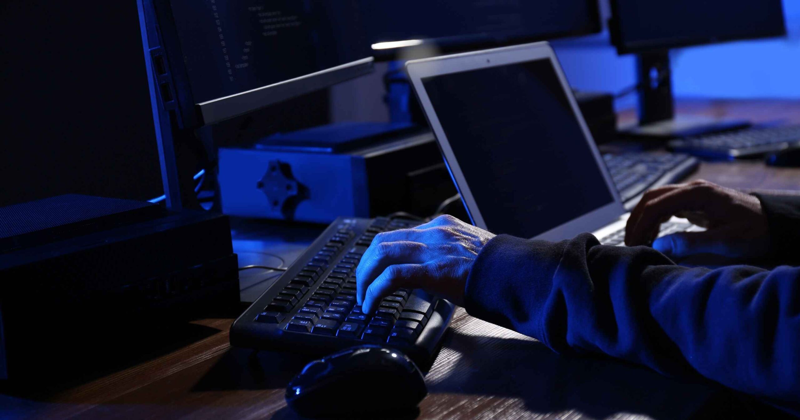 Cyber criminal on a computer
